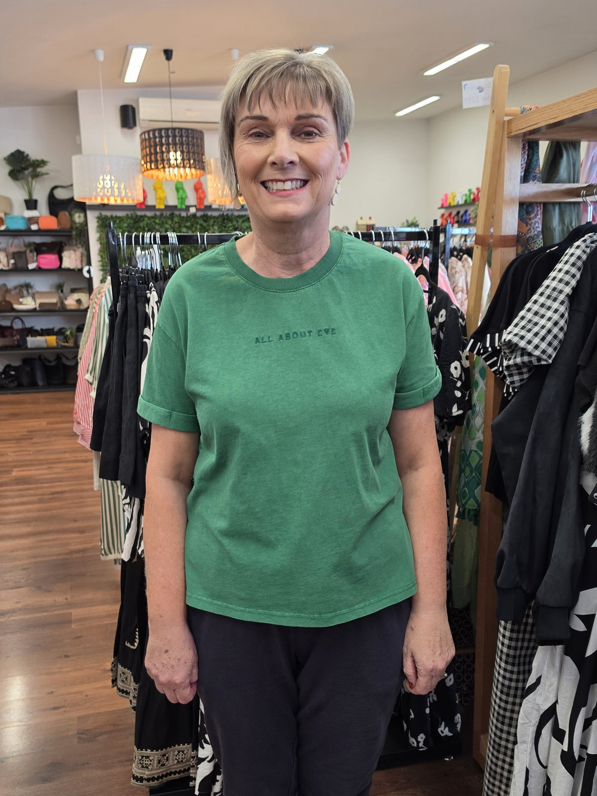 Jan wearing a bright green tee from All About Eve at Spoilt Boutique