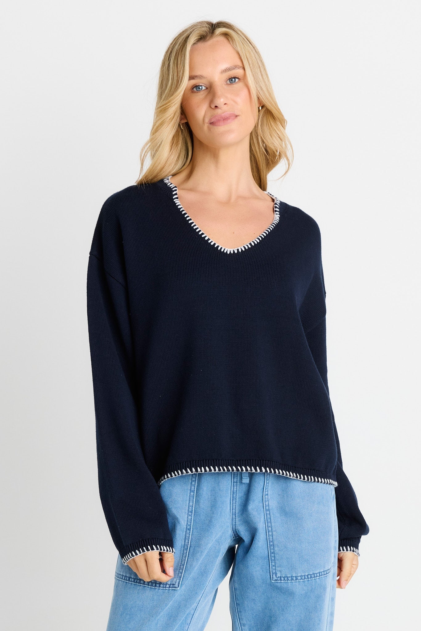 Women wearing navy sweater