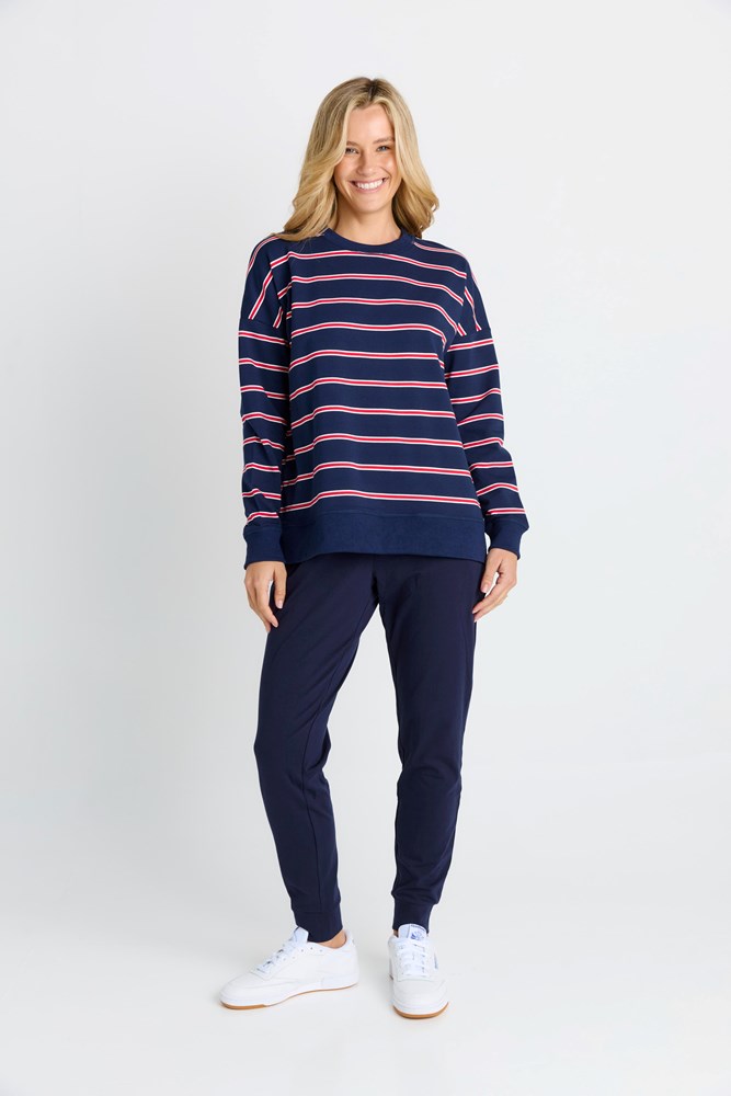 Women in a Navy and Red Stripe Sweatshirt