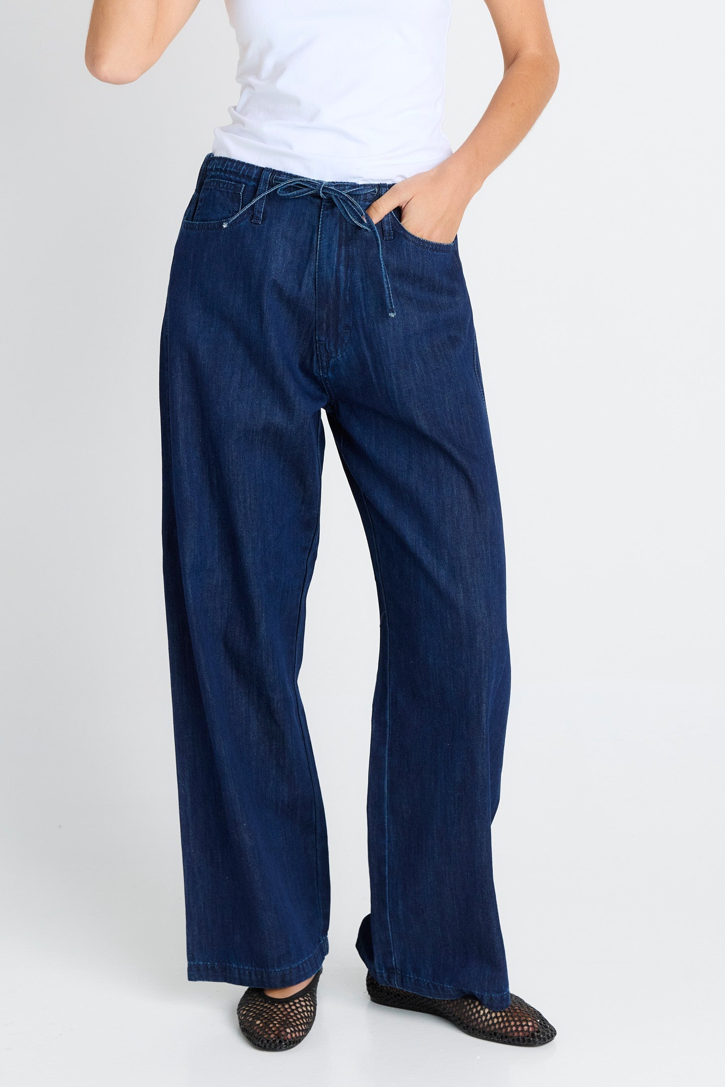Women wearing navy jeans