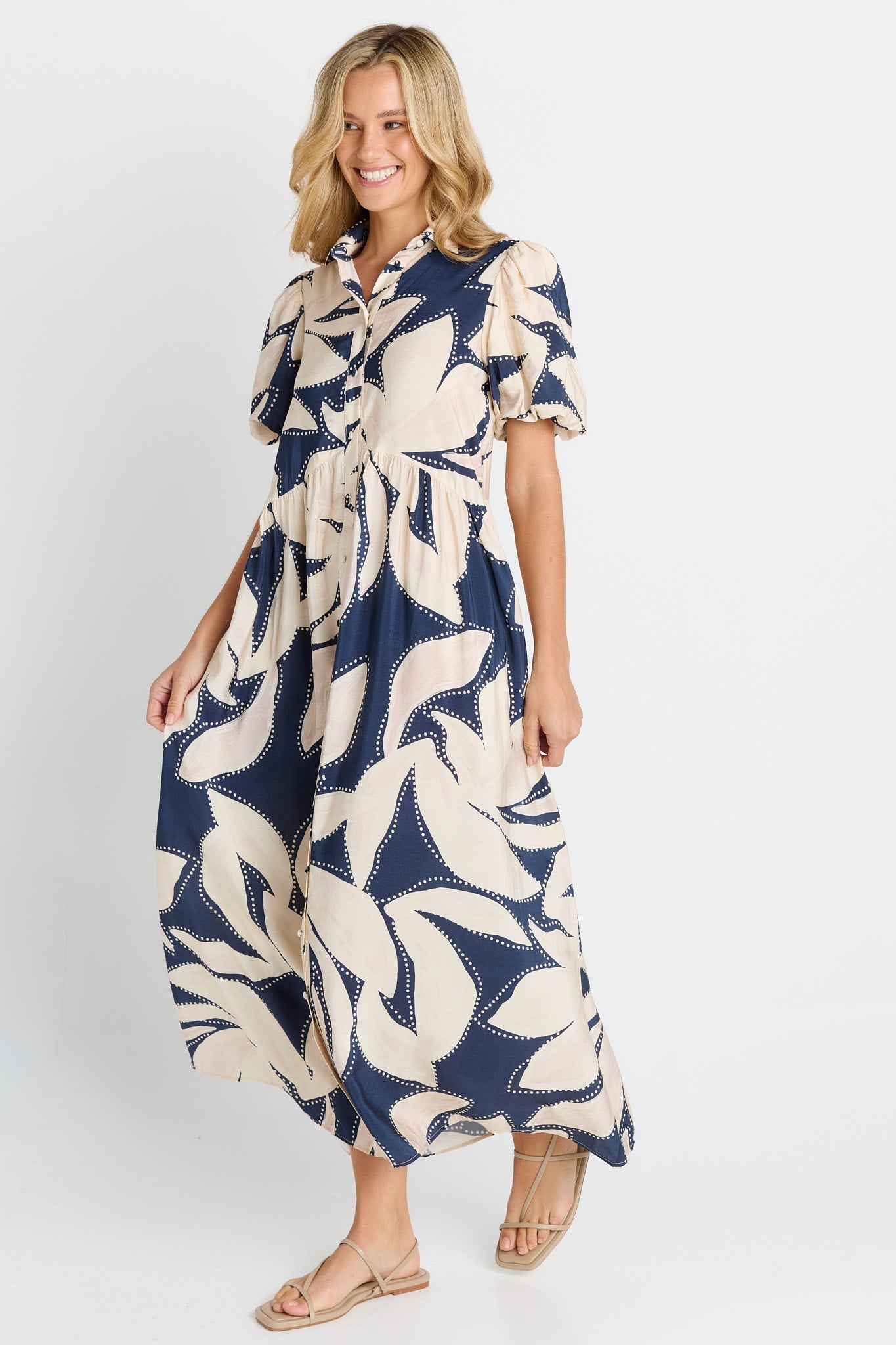 Women in a navy floral print Shirt Dress
