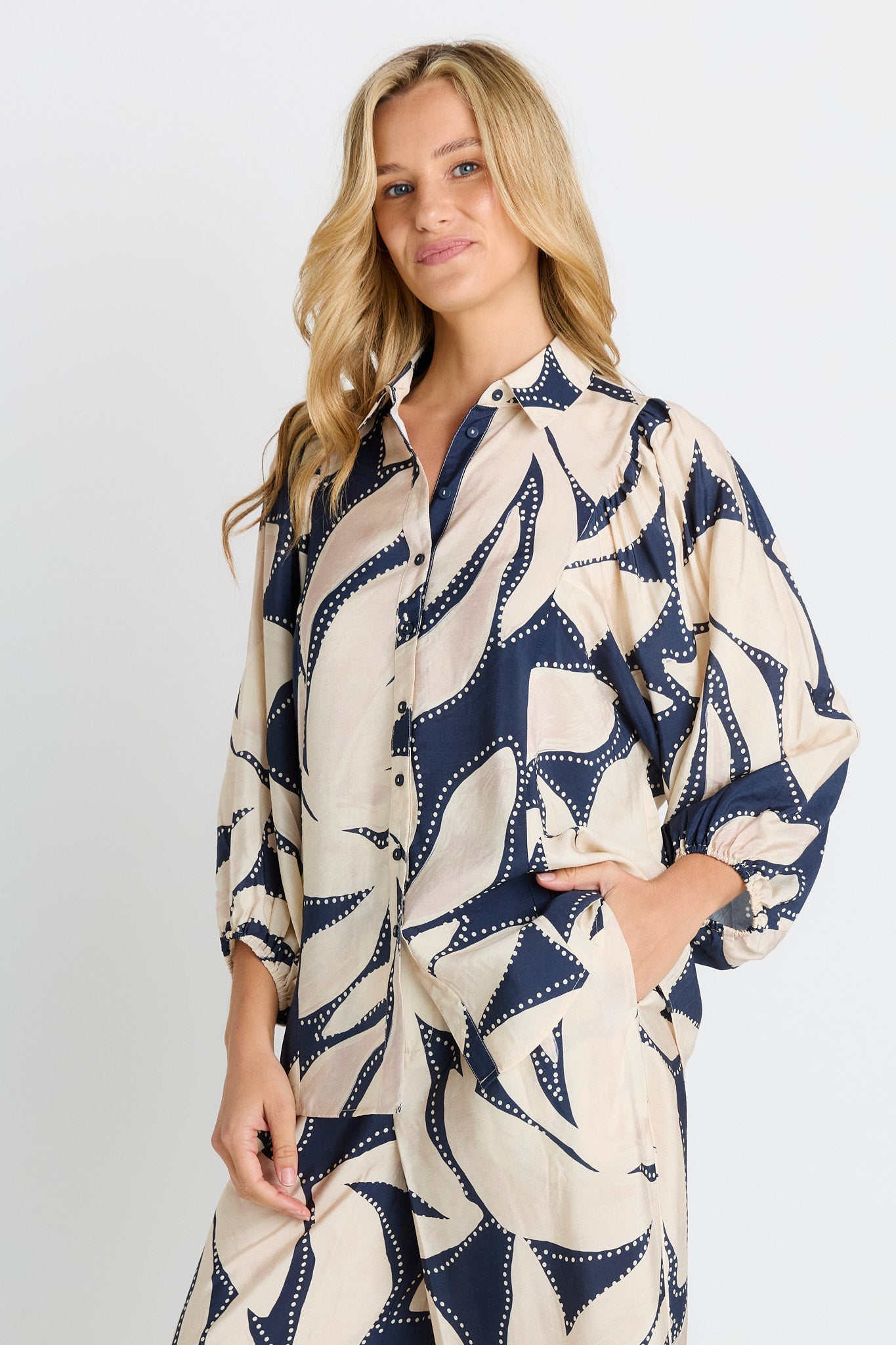 Woman wearing Navy & White Shirt