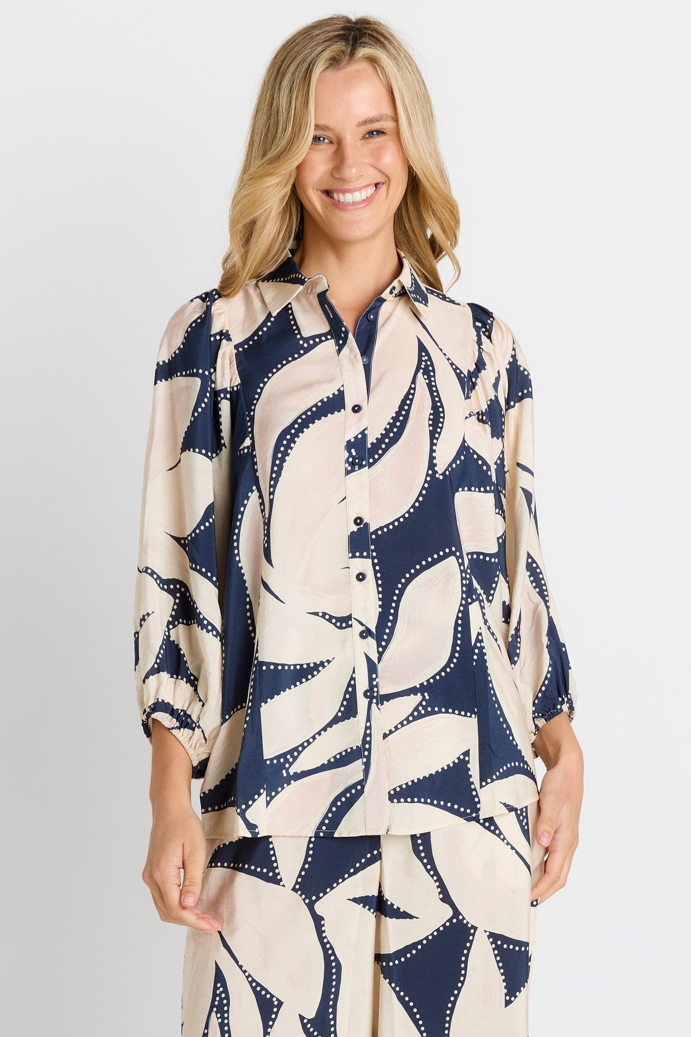Woman wearing Navy & White Shirt