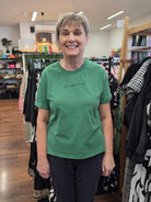 Jan wearing a bright green tee from All About Eve at Spoilt Boutique