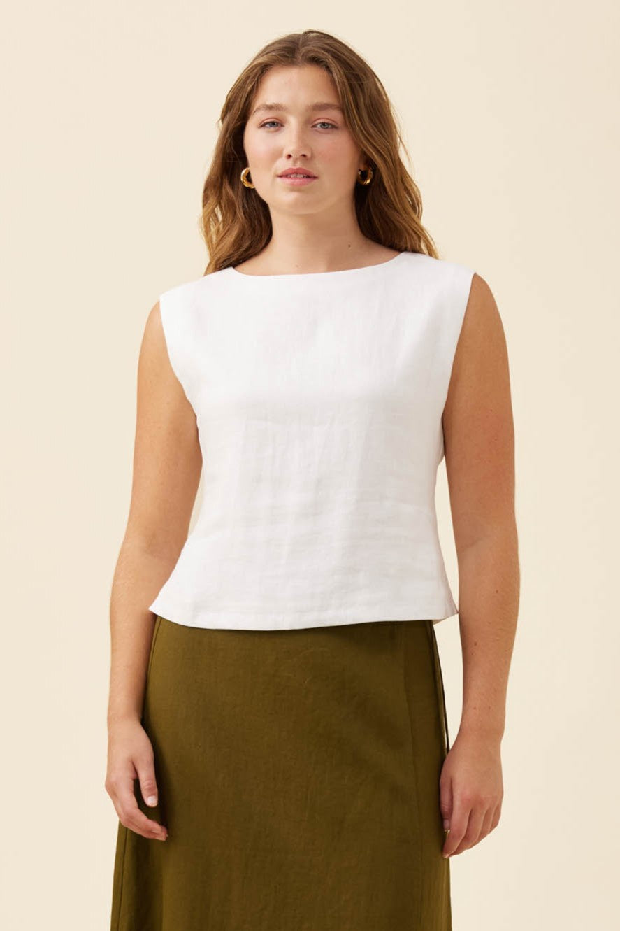 Women wearing a white tank top