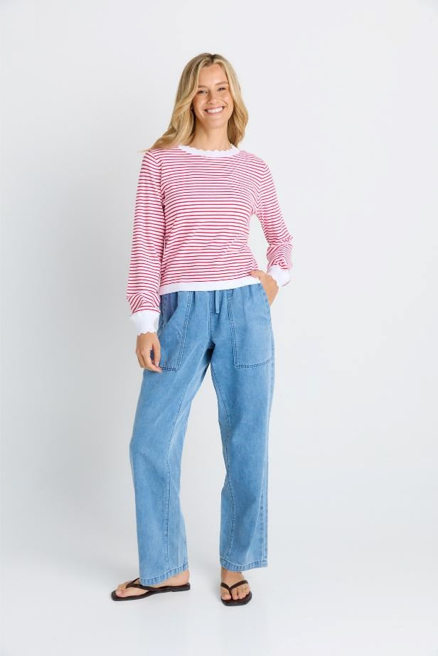 woman in white and red stripe sweater