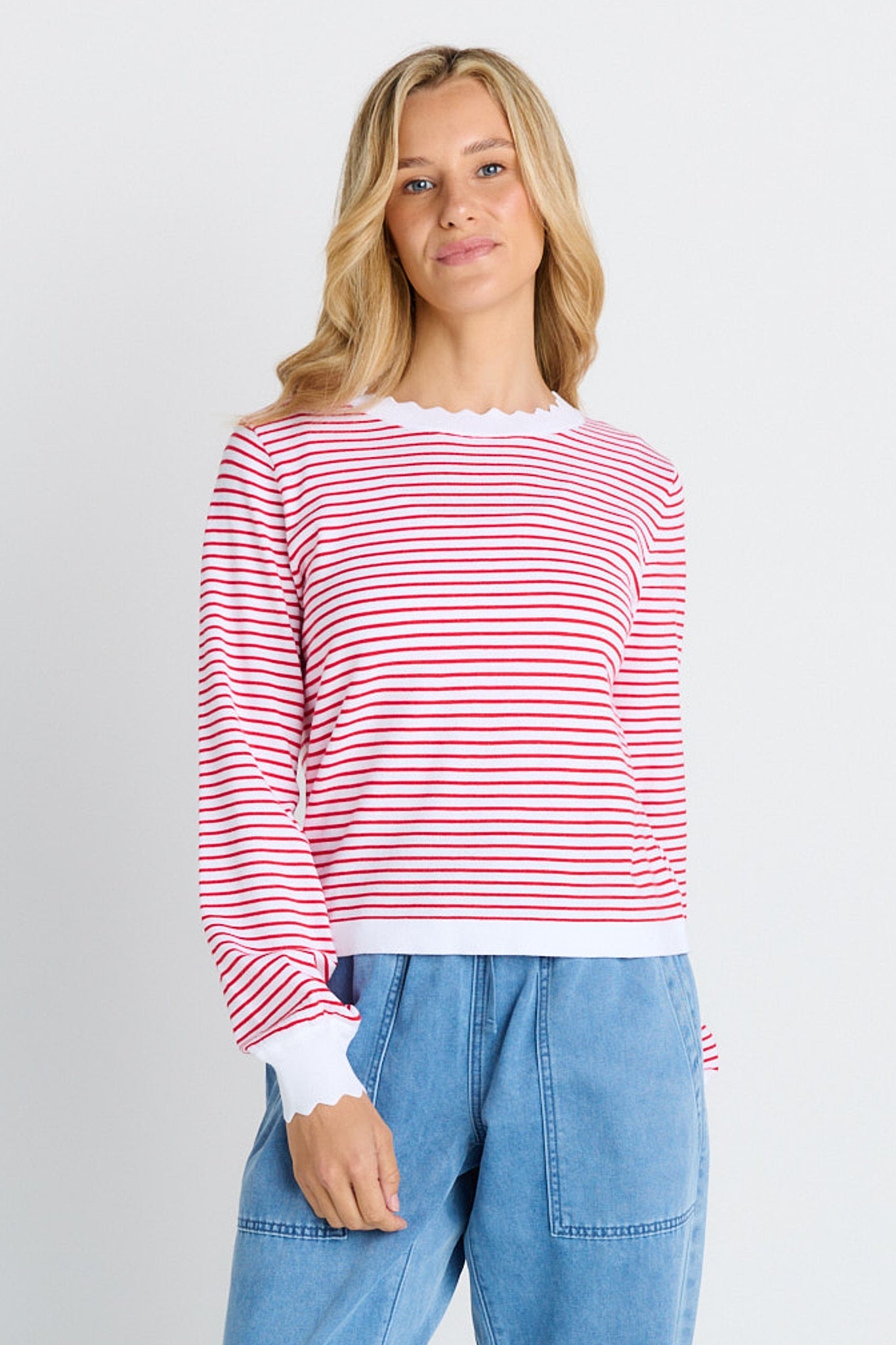 woman in white and red stripe sweater