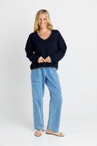 Women wearing navy sweater