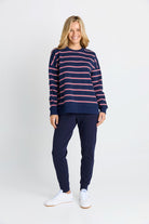 Women in a Navy and Red Stripe Sweatshirt