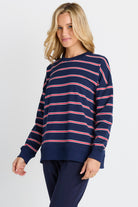 Women in a Navy and Red Stripe Sweatshirt