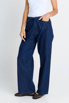 Women wearing navy jeans