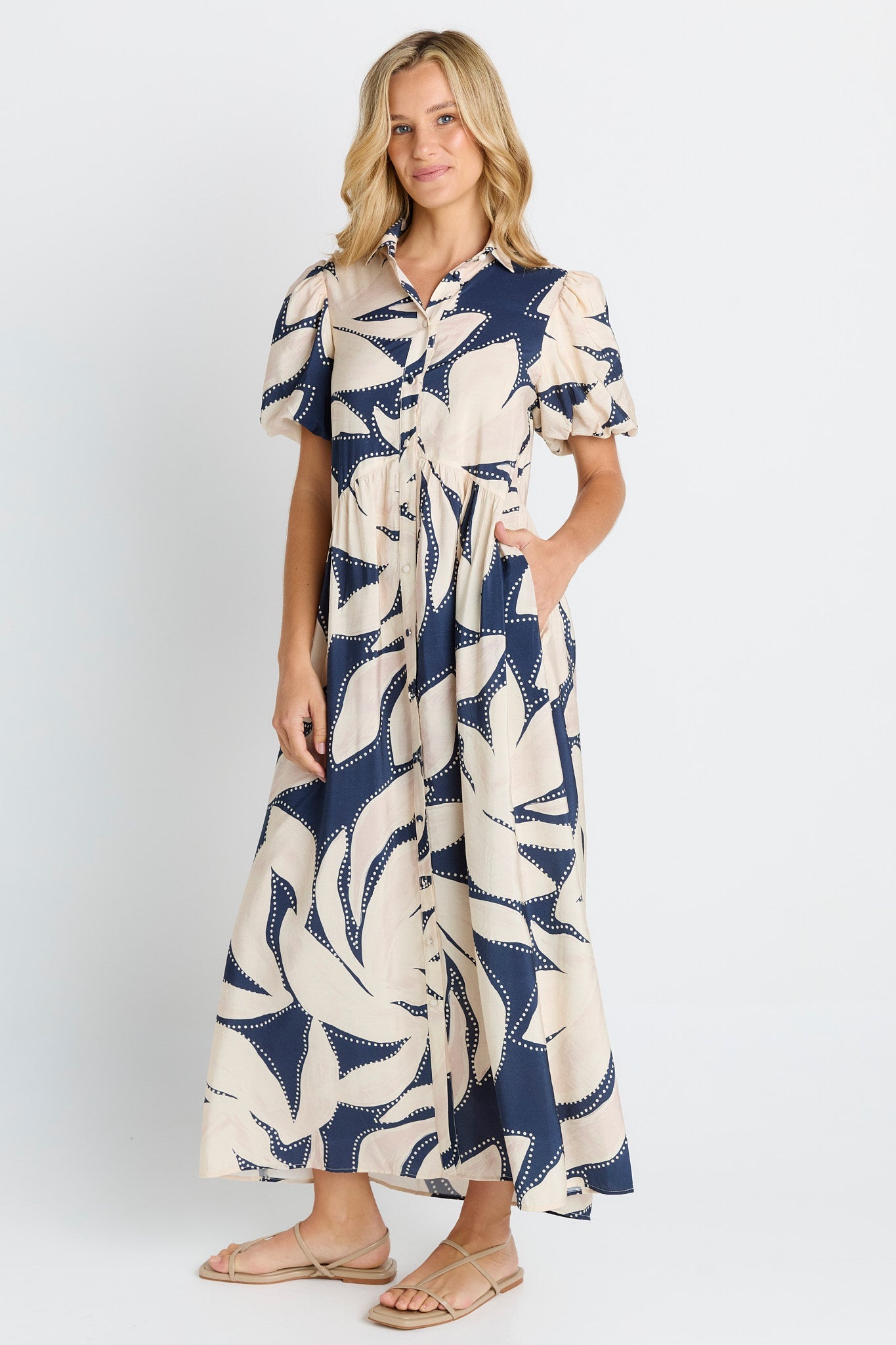 Women in a navy floral print Shirt Dress