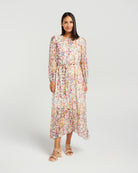 Woman wearing a floral dress on a white background