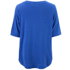 A royal blue short-sleeve knit top shown from the back, featuring a textured waffle or ribbed fabric and a curved hem, set against a plain white background.