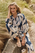 Woman wearing Navy & White Shirt