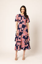 Women wearing a pink floral pattern dress